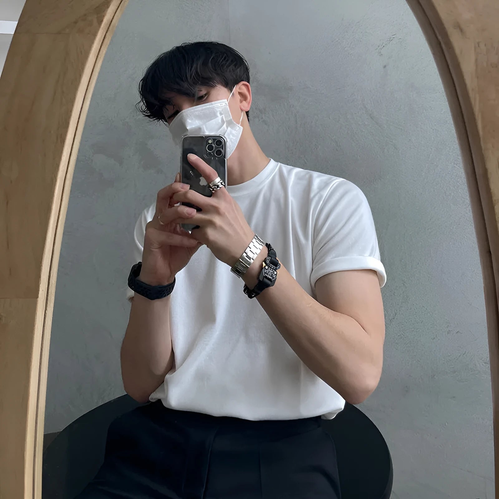 Men's slim fit cotton t-shirt in white or black with round neck and half sleeves.