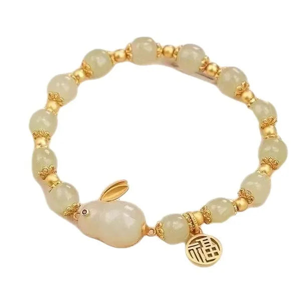 Green jade hare bracelet with Chinese zodiac design and electroplated finish