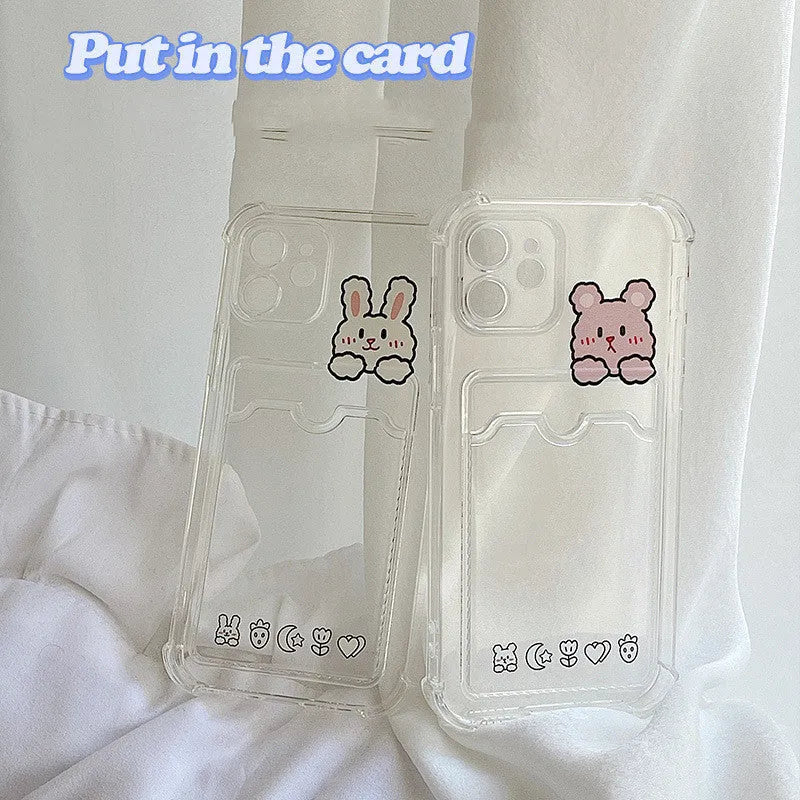 Clear cartoon-patterned iPhone case with a built-in card holder on the back.
