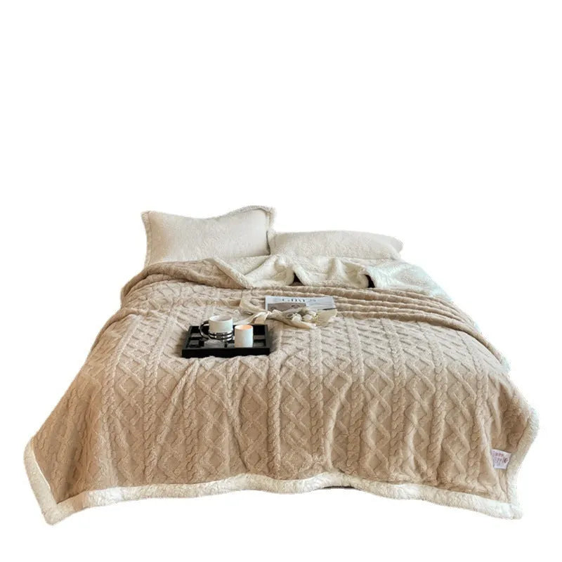 Polyester thermal flannel blanket in tea green colour on a double bed, showing 180x200cm size.