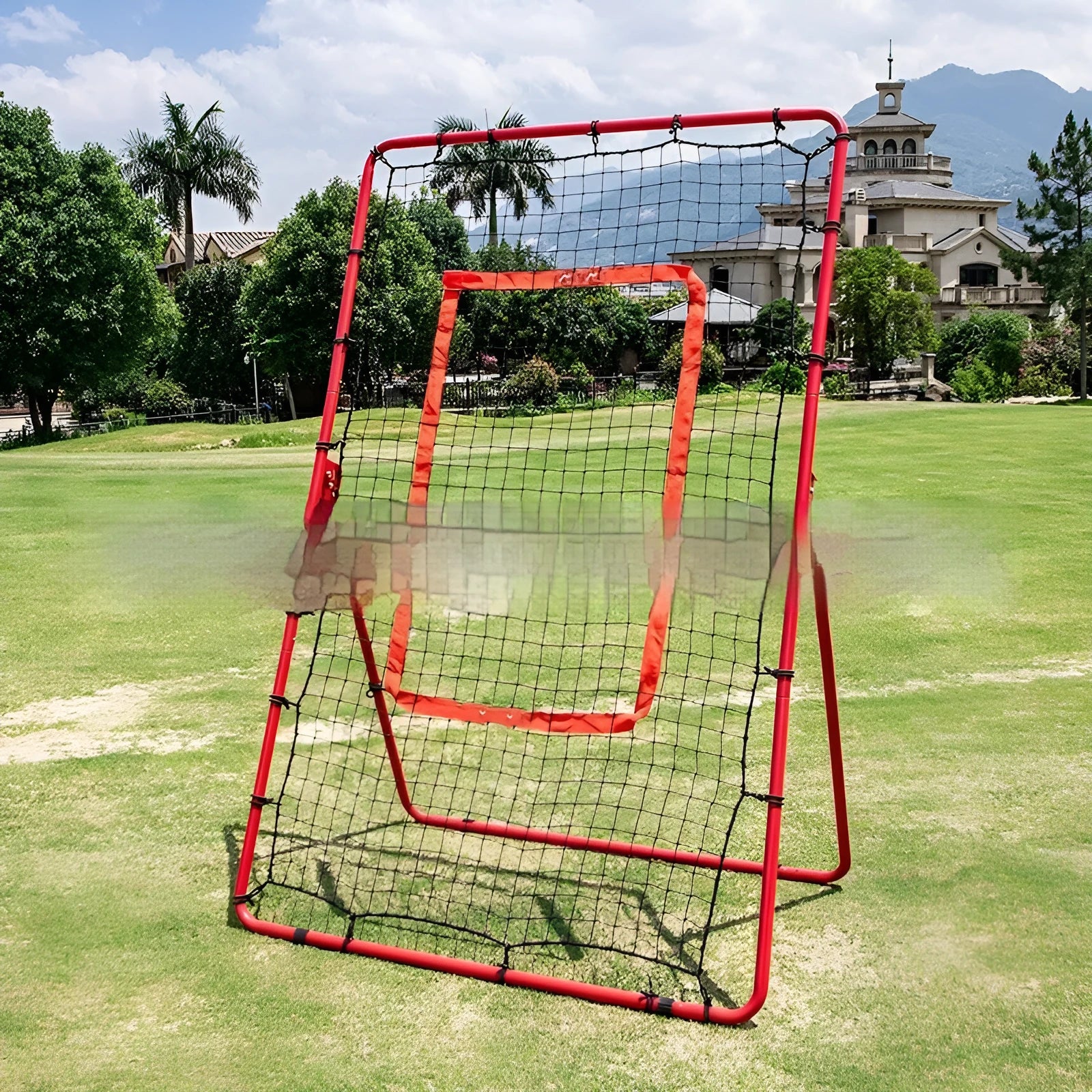 Red portable ball training net with metal frame set up for practice