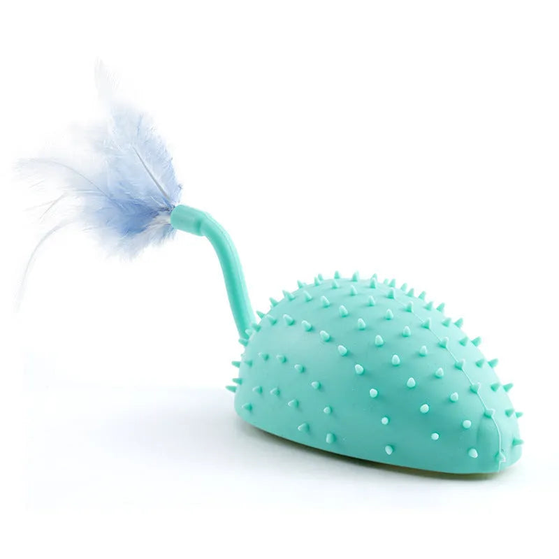 Remote control and USB rechargeable silicone mouse-shaped cat toy with attached feathers, in cyan colour.