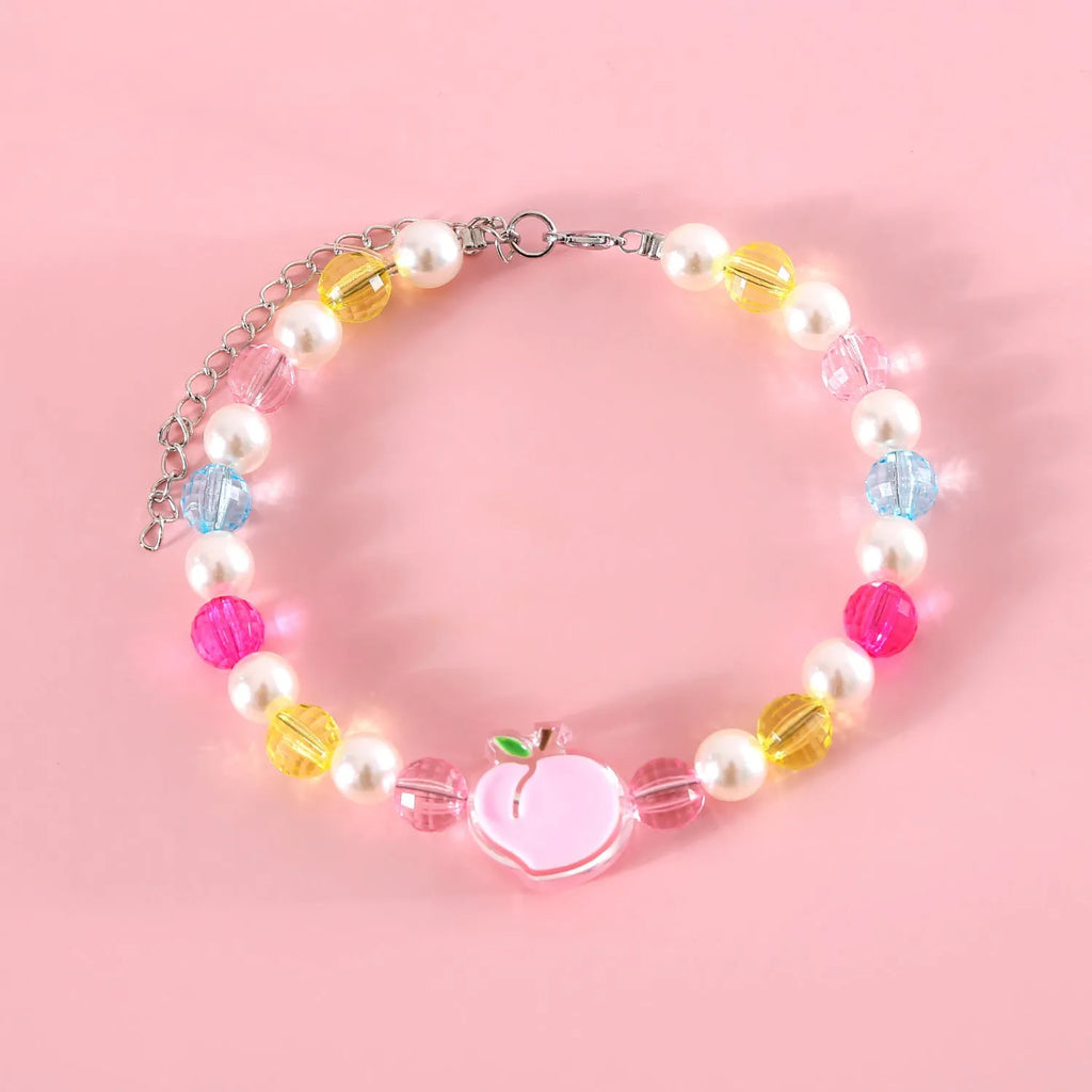 Colourful plastic cat necklace with bead patterns in rainbow, peach or small flower designs on adjustable 15-35cm collar