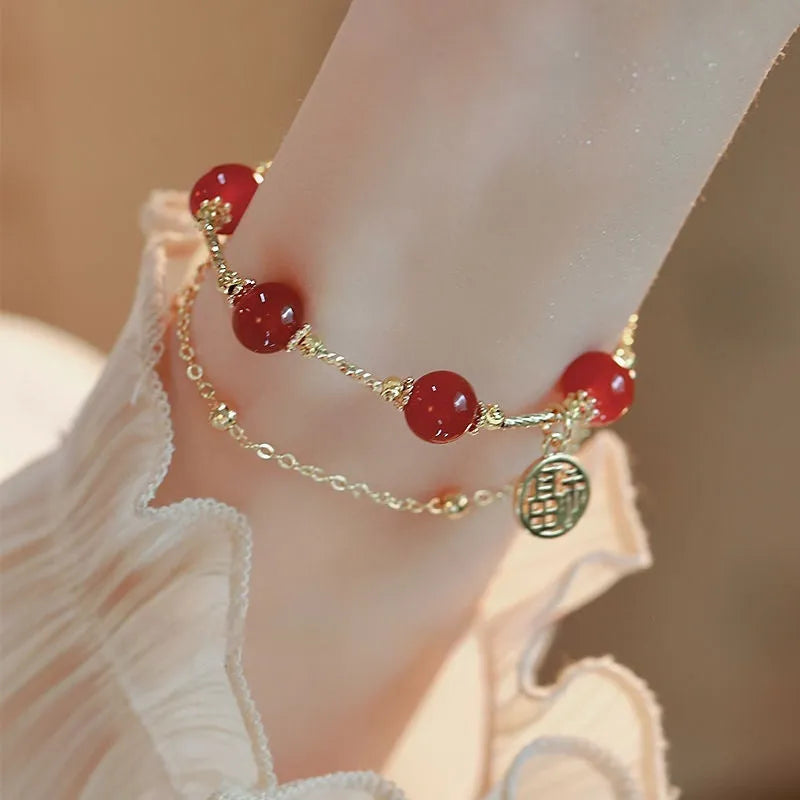 Women's red agate and alloy Hongma lucky card double-layer bracelet in gift box.