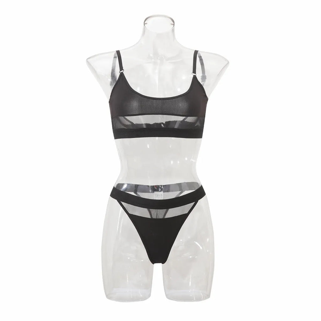 Women's black full cup bra and pants underwear set with adjustable straps on a mannequin.