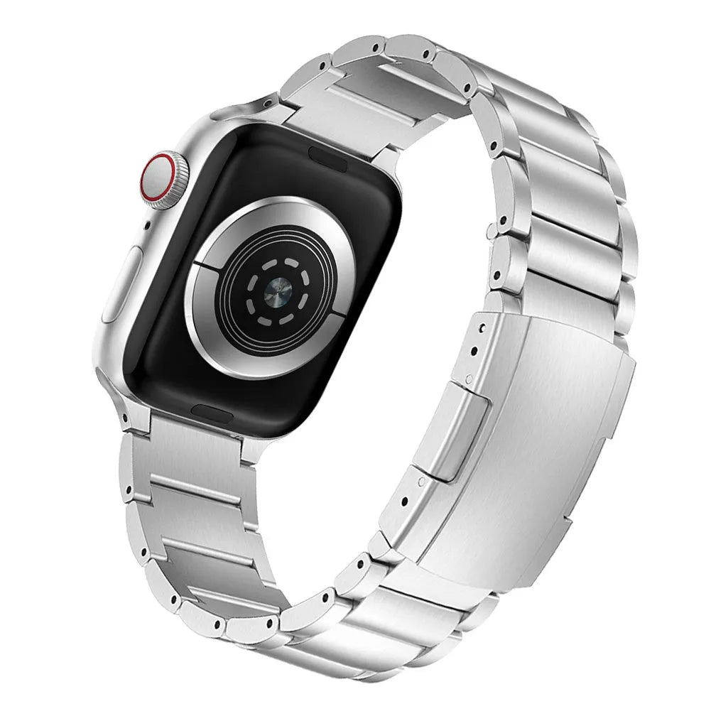 Titanium Apple Watch replacement strap with folding buckle in black and silver options