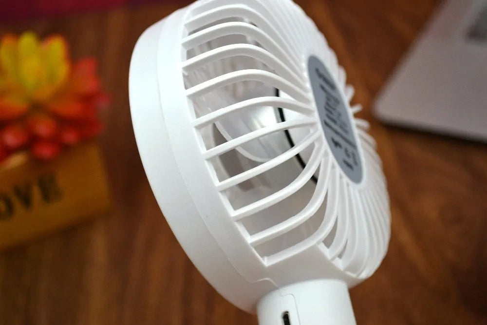 White USB rechargeable portable fan with three speed settings and 2000mAh battery