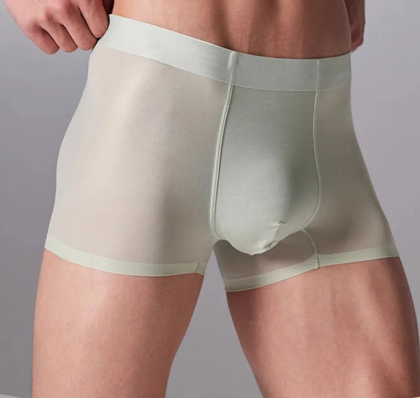 Lightweight seamless men's fitness underwear in black, shown flat, highlighting the antibacterial lining and stretch fabric.