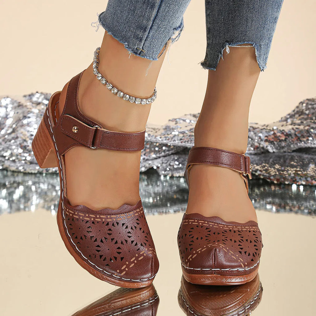 Women's hollow-out chunky-heel closed-toe sandals in black with Velcro strap and rubber outsole