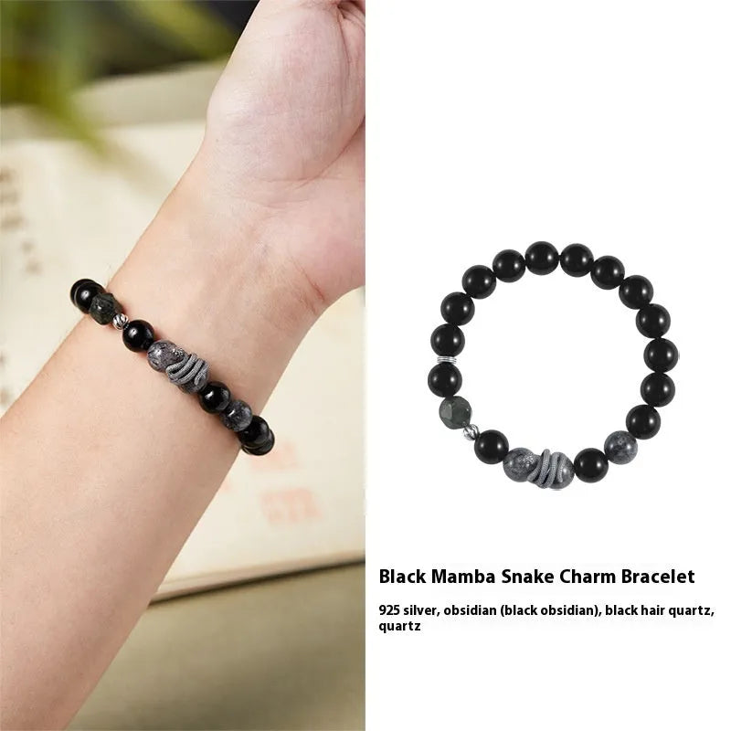 S925 sterling silver men's bracelet with black obsidian crystal and detailed snake design on a wrist.