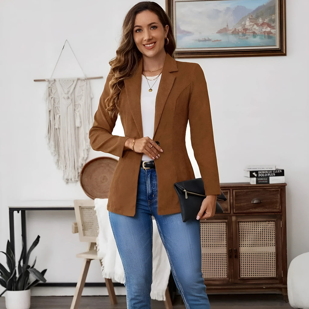 Brown long sleeve single-breasted suit coat with lapel collar on a hanger.