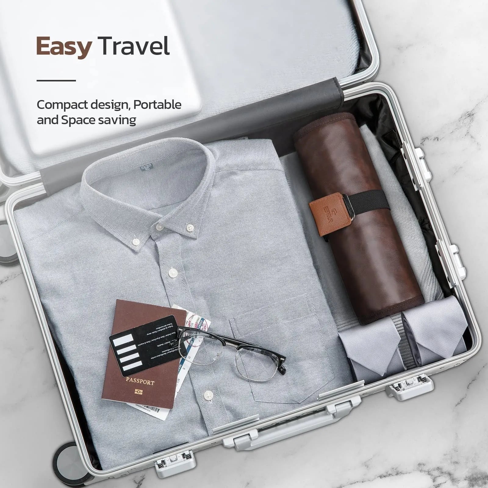 Men's black portable PU travel wash bag with toiletry items inside.