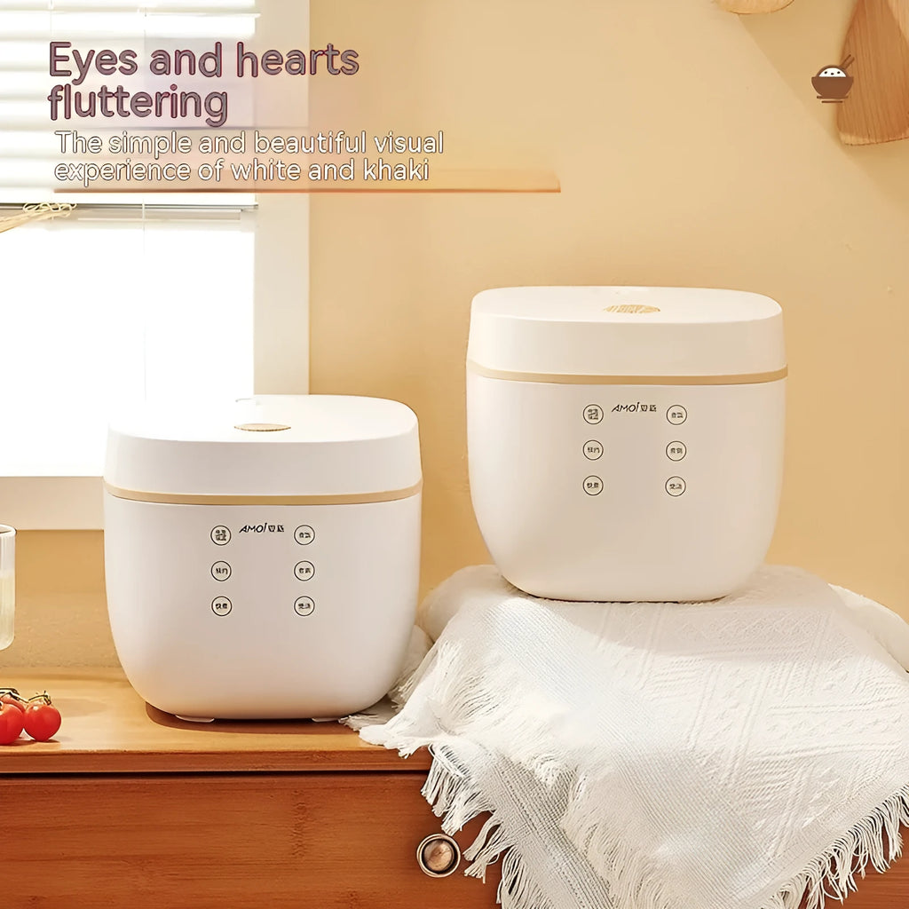 White intelligent rice cooker with black crystal inner pot and accessories