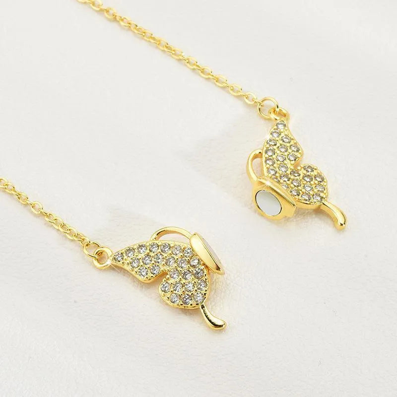 Women's magnetic snap butterfly necklace with twisted chain in gold or silver titanium steel