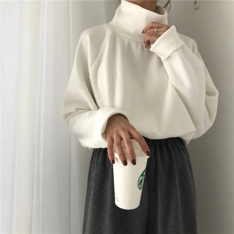 Women's solid colour long sleeve top with half-high collar in loose fit