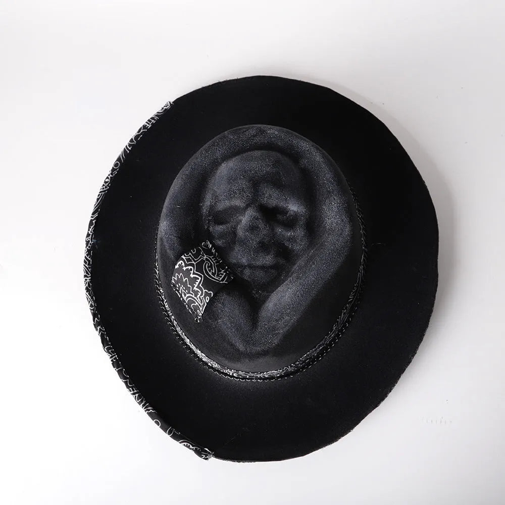 Handmade wool felt skull hat with a conical crown, shown in the colour Skull Hat.
