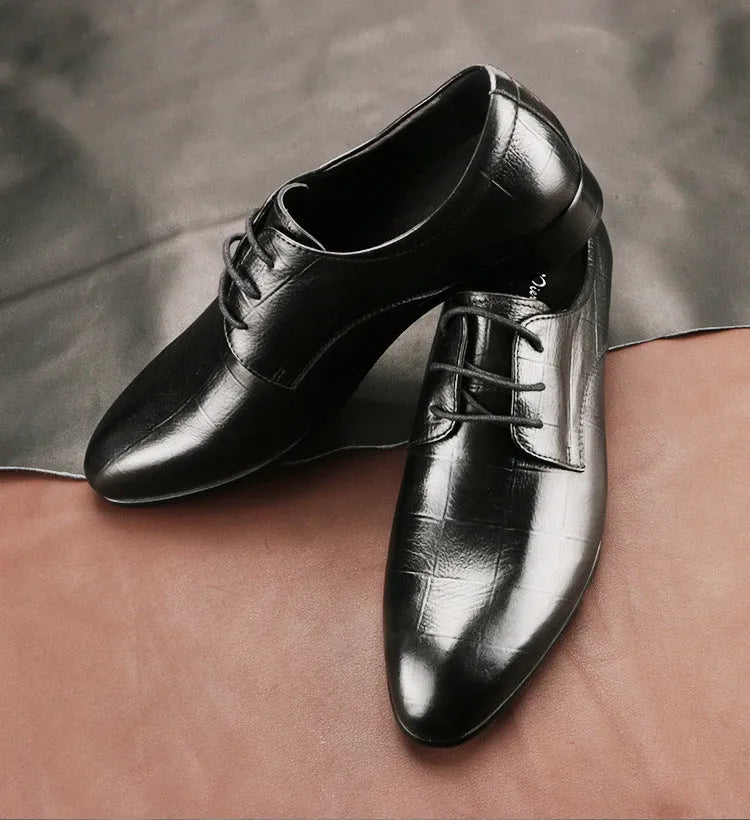Men's black leather derby shoes with pointed toe and rubber sole