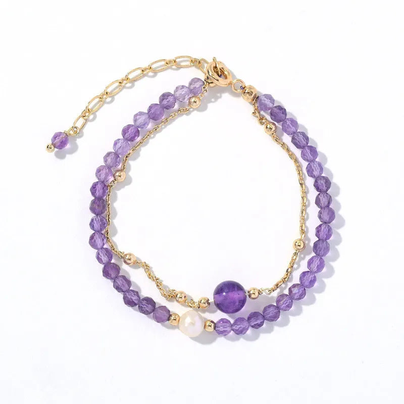 Women's Chinese style crystal bracelet with diamond-shaped pearls and electroplated finish in amethyst colour