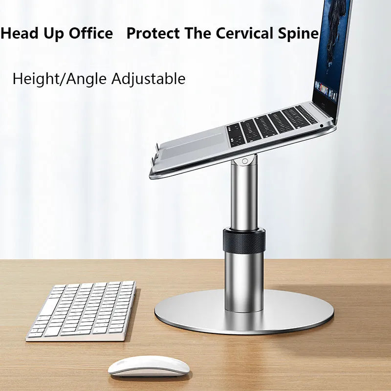 Silver adjustable aluminium car laptop stand with rotating base on a car seat.
