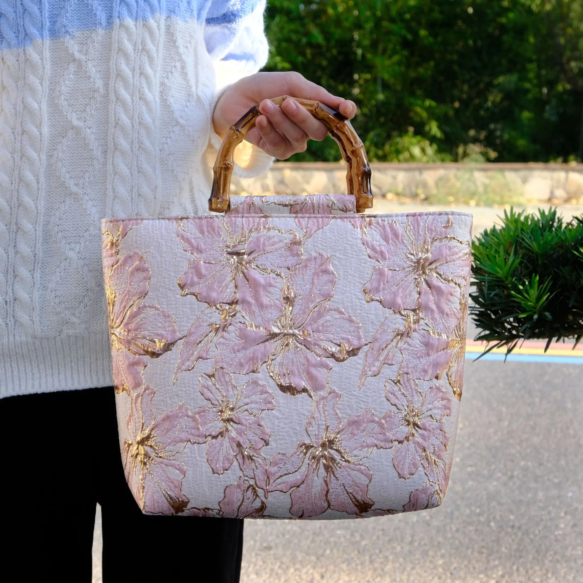 Women's light blue canvas bag with bronzing flower detailing and double shoulder straps