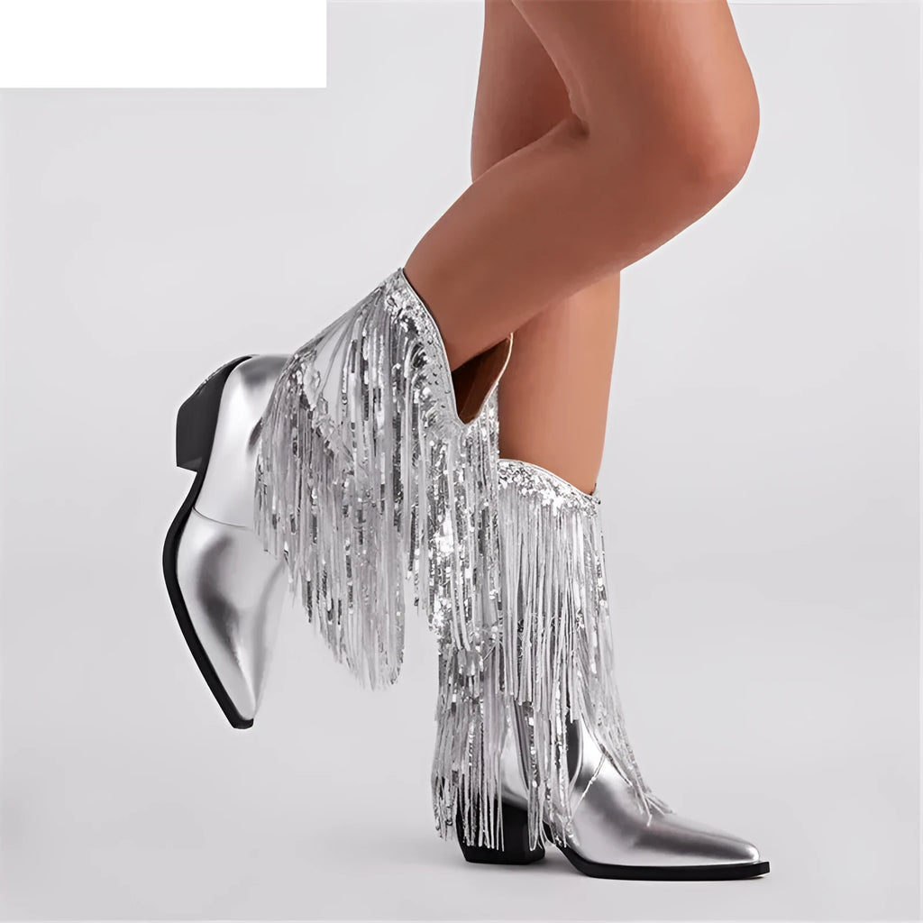 Women's brown chunky heel ankle boots with tassel detail and a high stiletto heel on a white background.