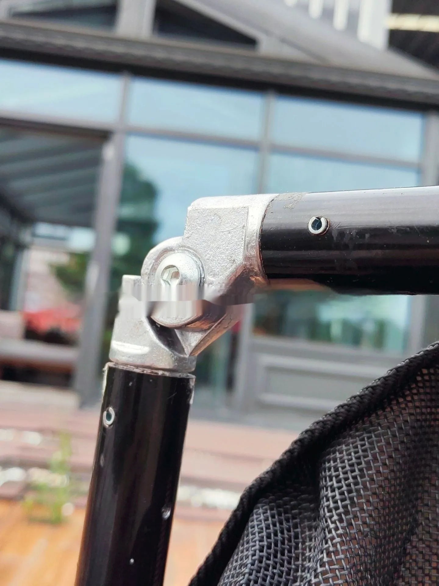 Black foldable aluminium alloy pet stretcher shown folded and unfolded, for large dog transport.