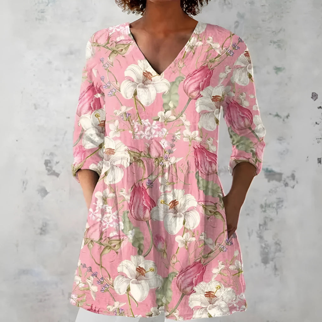 Women's slim fit long-sleeved top with a retro all-over digital print, shown in a selected colour.