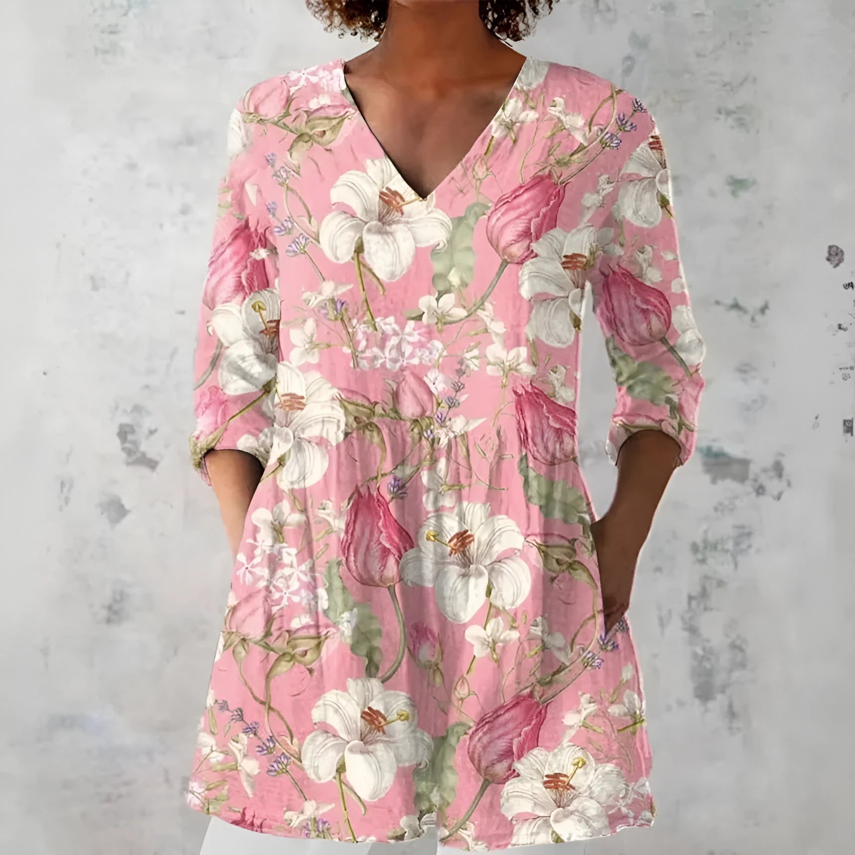 Women's slim fit long-sleeved top with a retro all-over digital print, shown in a selected colour.