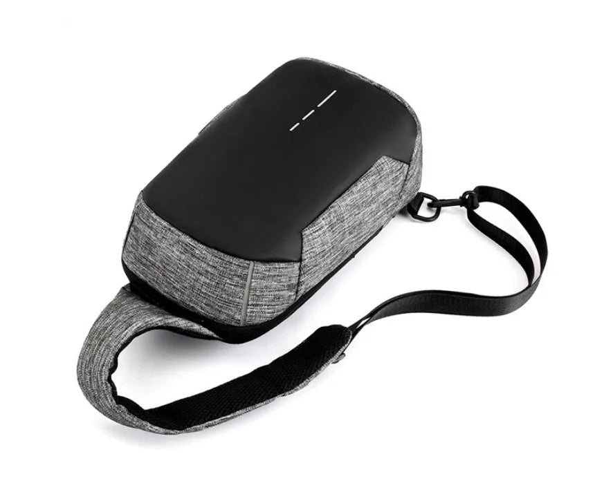 Dark blue Oxford cloth waterproof chest bag with zipper and adjustable strap, showing internal mobile phone pouch.