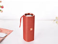Wireless Bluetooth speaker with cloth cover in multiple colours showing front speaker grille and control buttons