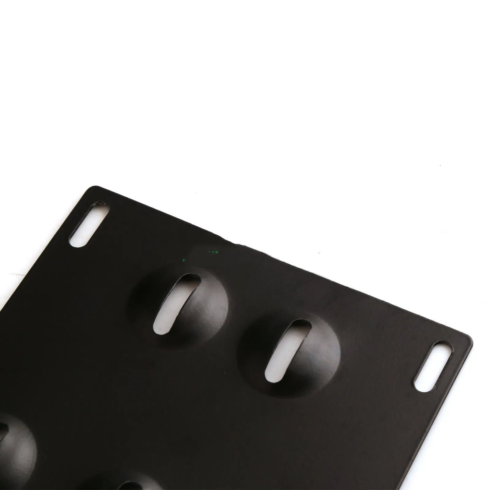 American-style metal car licence plate frame with an integrated central trailer hook.