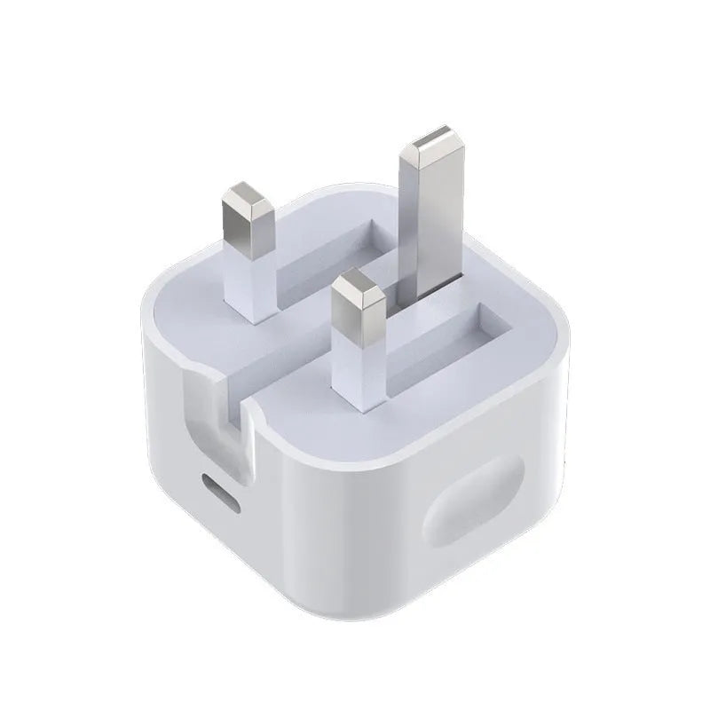 White 20W USB-C PD fast charger with UK plug and a coiled charging cable.