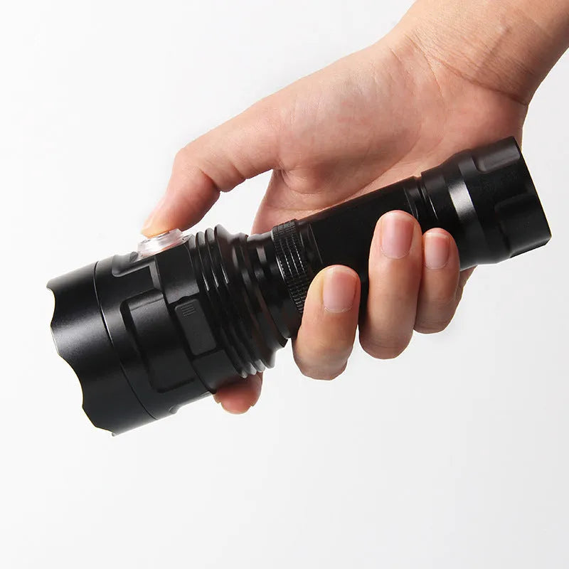 Black aluminium alloy XHP90 LED tactical flashlight showing head and body details.