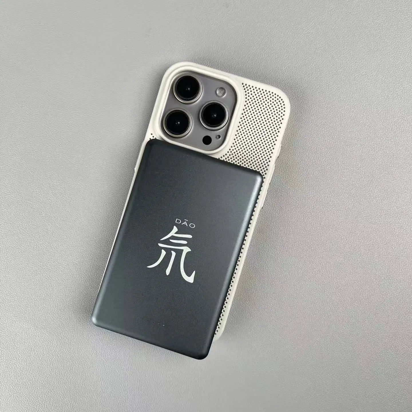 Frosted magnetic iPhone case in blue showing heat dissipation design and shockproof construction