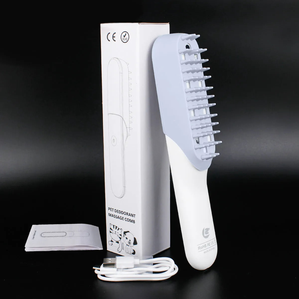 Blue ABS pet grooming comb with removable silicone massage head and ozone sterilisation function