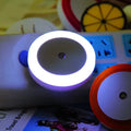 Portable round halo LED induction nightlight for stalls in blue, rad, white, or yellow