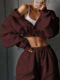 Long sleeve polyester sports sweater suit two-piece set in light grey, showing coat and trousers.