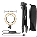 Silver adjustable live streaming phone stand extended to full height with gooseneck arm holding a smartphone.