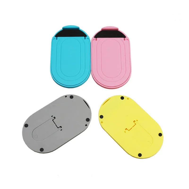 Plastic mobile phone stand in six colours showing 360-degree rotation feature