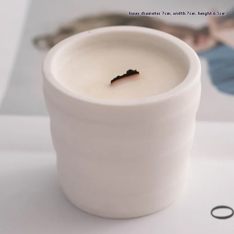 Minimalist relief ceramic candlestick round shape semi-handmade on dining table