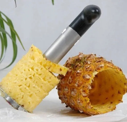 Stainless steel pineapple corer slicer with coloured handles for kitchen use