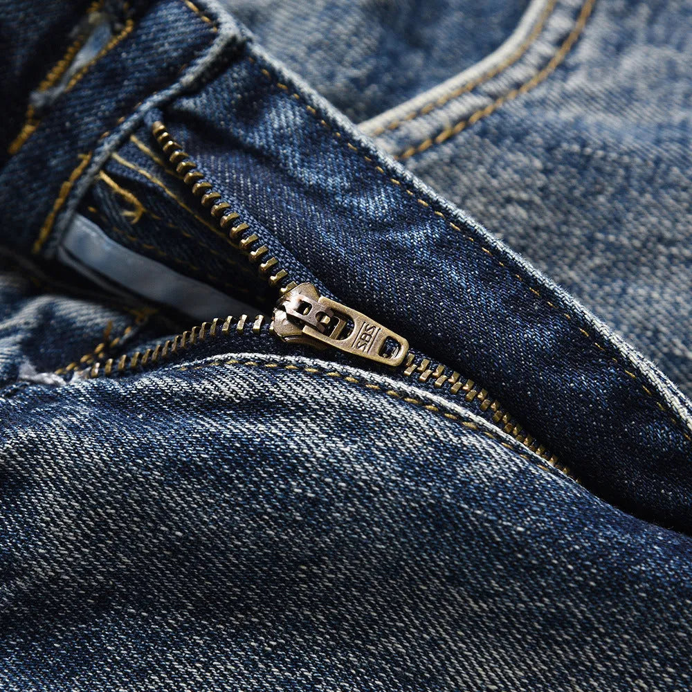 Men's blue denim punk loose straight trousers on a model, casual fit