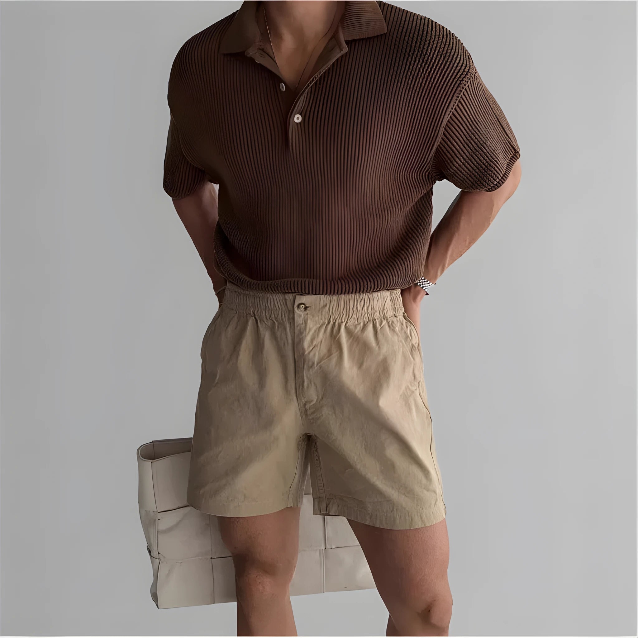 Cotton sports shorts in loose fit design shown in black, white and khaki colours