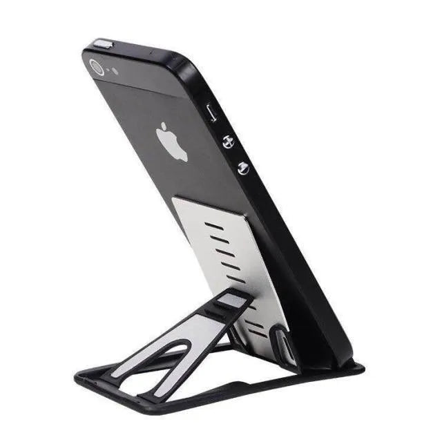 Black card phone holder bracket measuring 8.5cm by 5cm on desktop