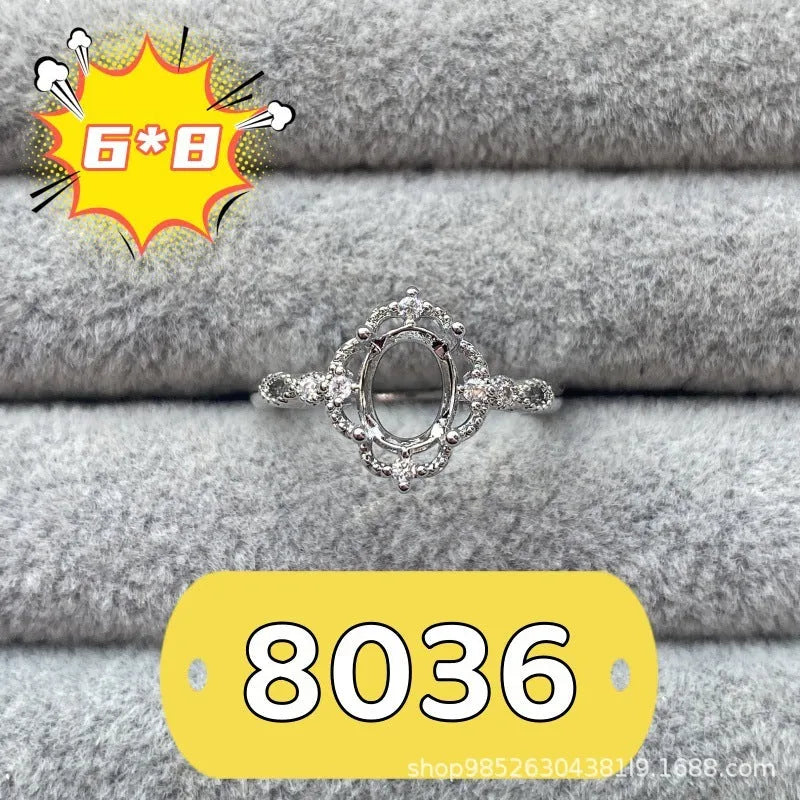Oval denier ring with 6x8mm stone and five-pointed star detail on electroplated copper band