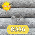 Oval denier ring with 6x8mm stone and five-pointed star detail on electroplated copper band
