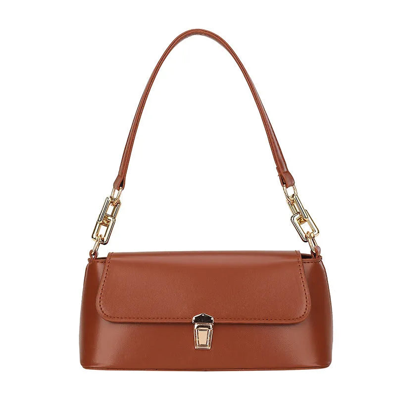 Brown French style casual underarm bag with a single shoulder chain, showing sandwich pocket and sewing thread detail.