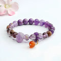Nine purple fire amethyst and red agate Mori style bracelet with 8mm beads on adjustable cord.