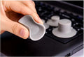 Four grey plastic non-slip cooling pads for laptops, shown in two different sizes.