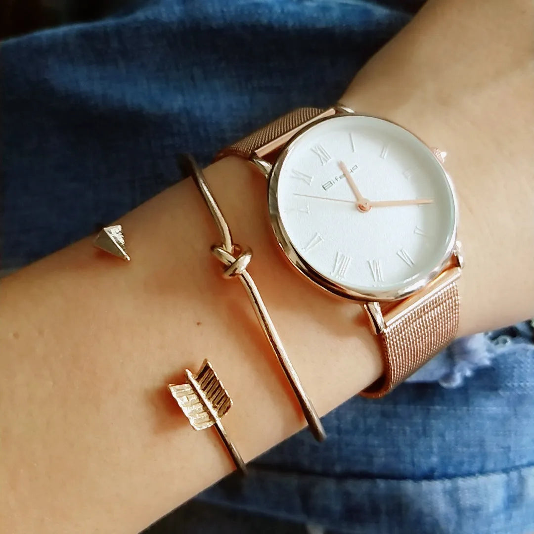 Women's gold vintage cuff bracelet with knotted arrow design in electroplated alloy